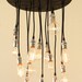 Round Urban Chandy reclaimed wood chandelier with vintage style bulbs