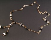 Vintage 1920s Black and Crystal glass foil bead necklace with rolled gold wire - perfect condition