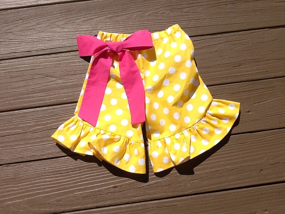 Girls ruffle knee shorts, capris, or pants with bow. Yellow white or any color polka dot. Custom children's clothing by EverythingSorella.