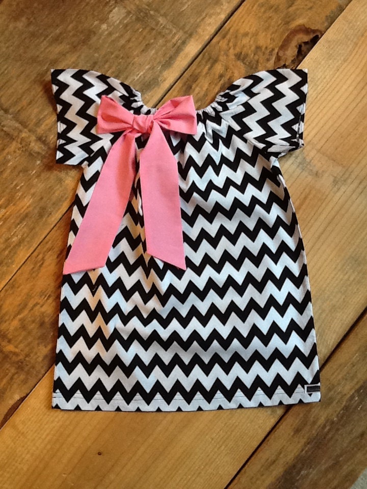 Girls Little Peasant Dress with fabric bow detail. Black white or any chevron fabric.  Custom children's clothing. By EverythingSorella