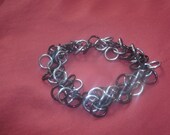 Hanging Bells Bracelet in Black and Black Ice