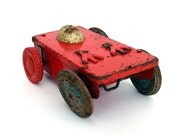 Quirky shabby chic part of a vintage metal wind up toy, a fun display