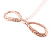 Magnitude Plait - Fishbone - bow pendant (auburn)