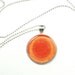 Orange Circles Necklace, Glass Pendant on Shiny Silver Chain