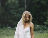 Elegant Ivory silk and French lace wedding gown