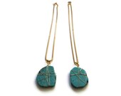 Turquoise pendant on gold plated chain