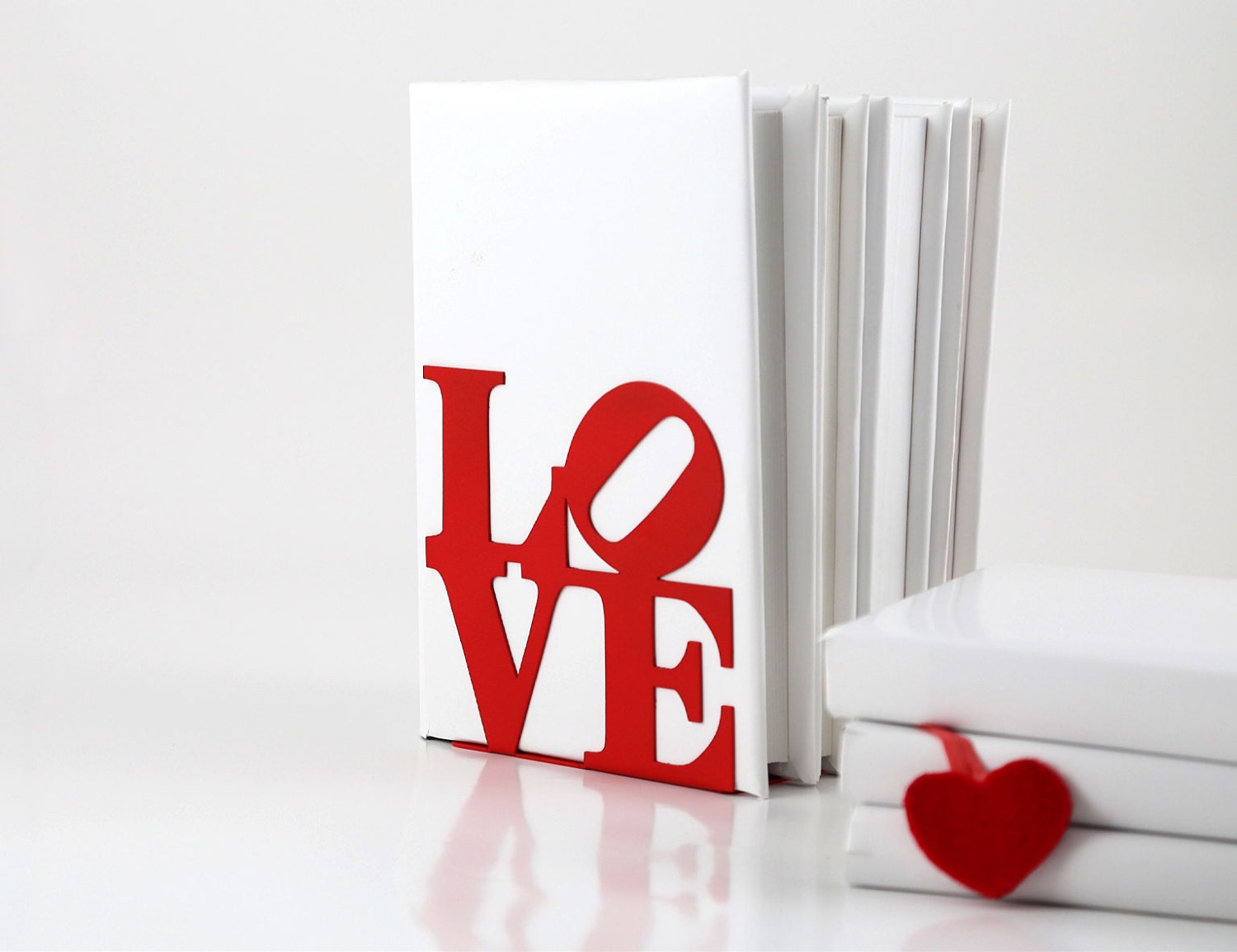 Bookend LoveOne red powder coated laser cut metal thick enough to hold books