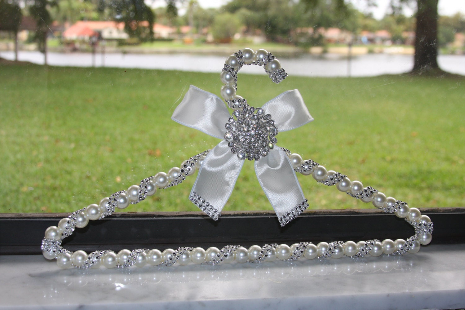 wedding dress hanger with pearl beads, brooch, ribbon and lots of bling makes great gift  and keepsake for bride and entire bridal party