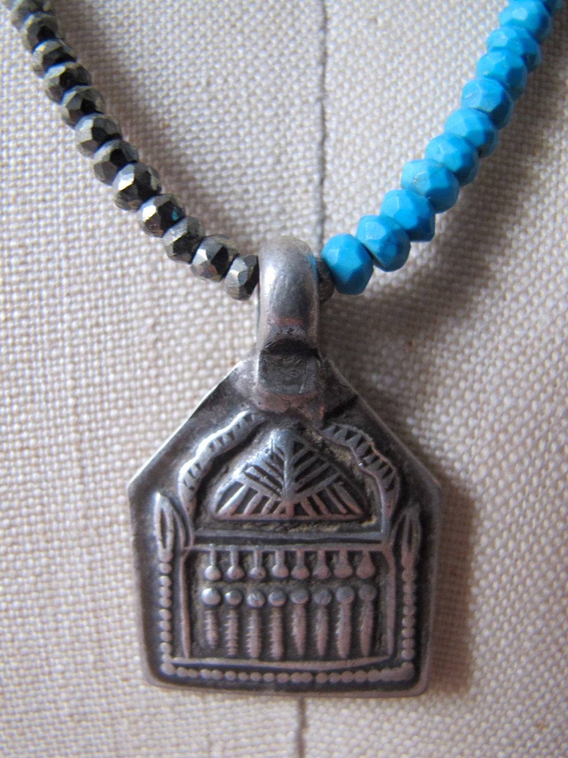 Necklace with Antique Indian Silver Amulet of The Dakini Goddesses and Faceted Turquoise and Silver Pyrite