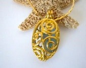 Gold tone, Locket Necklace with Blue Sea Glass