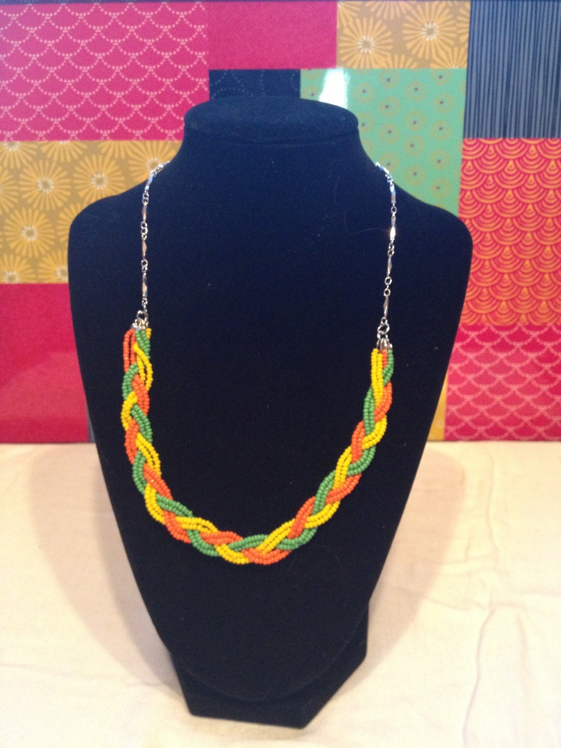 Yellow, orange, and greed braided necklace and earrings
