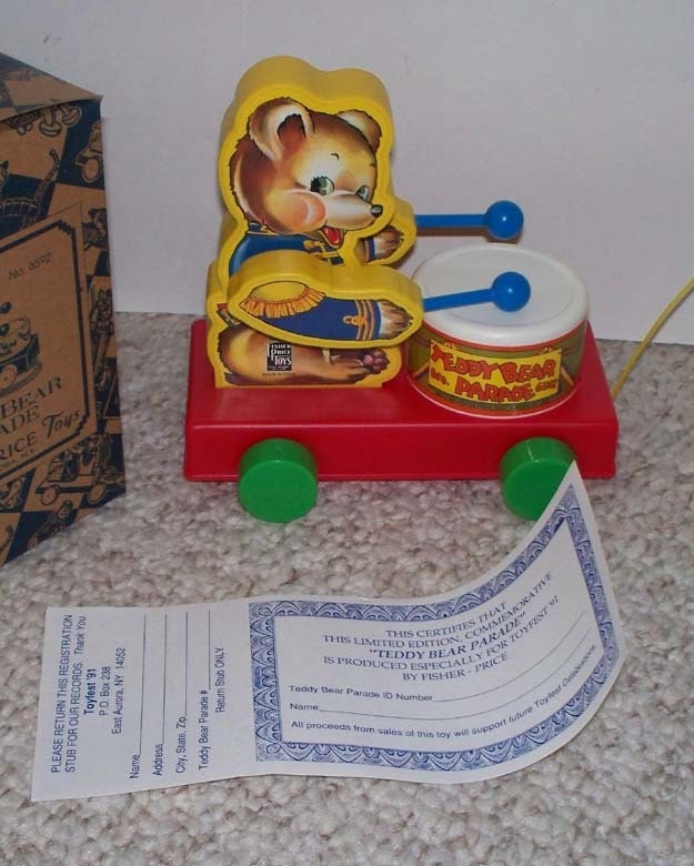 Limited Edition Fisher Price Toy fest numbered pull toy, replica of the original 1930s Teddy Bear Parade - toyfest