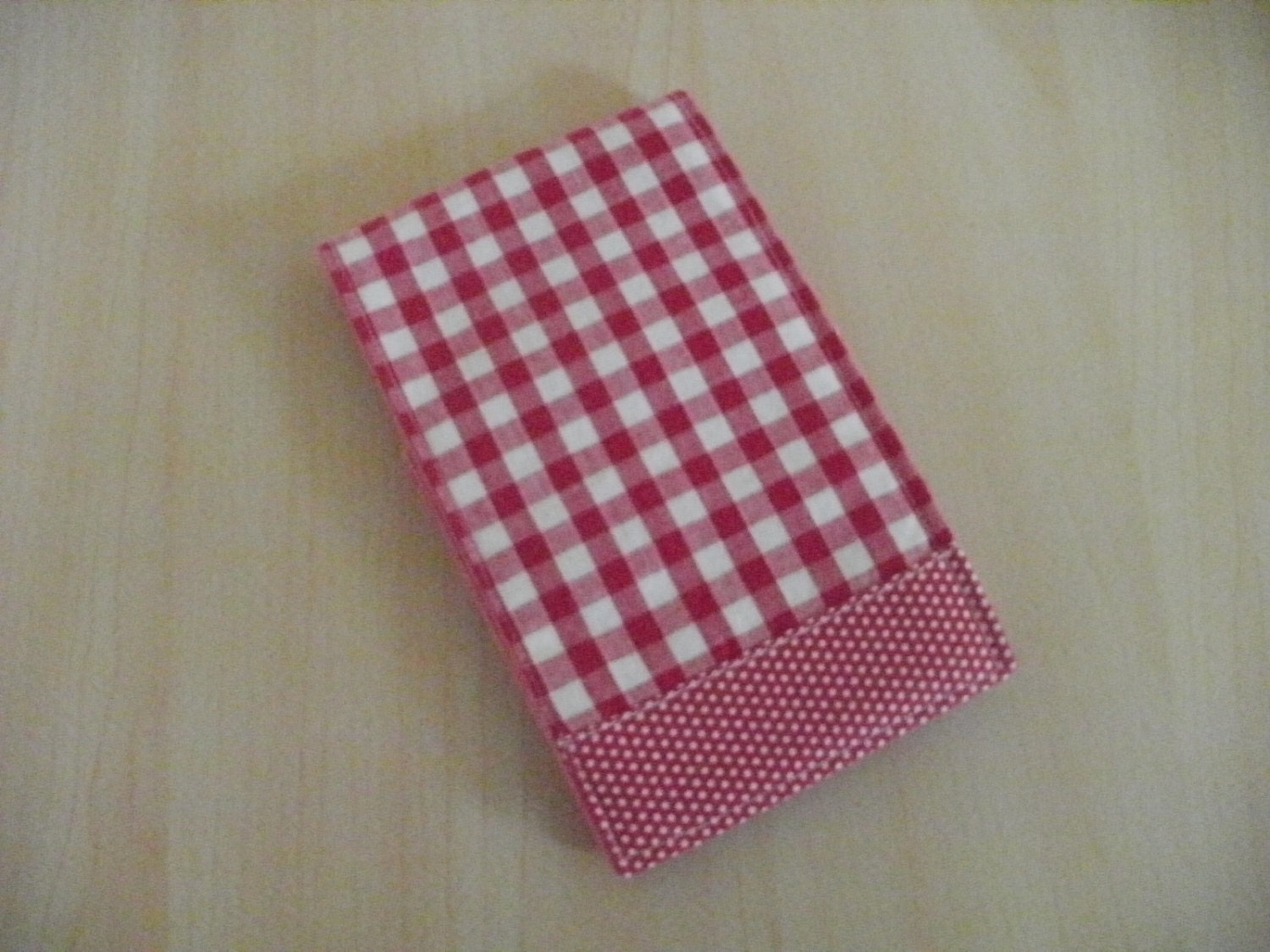 Red check and spot fabric note pad holder inc. pad.