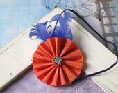 Colorful flapper style girls infant/baby/toddler headband. Peach and purple handmade ribbon pinwheel with feathers.