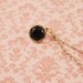 Sweater guard, cardigan clip, collar clip - black and gold