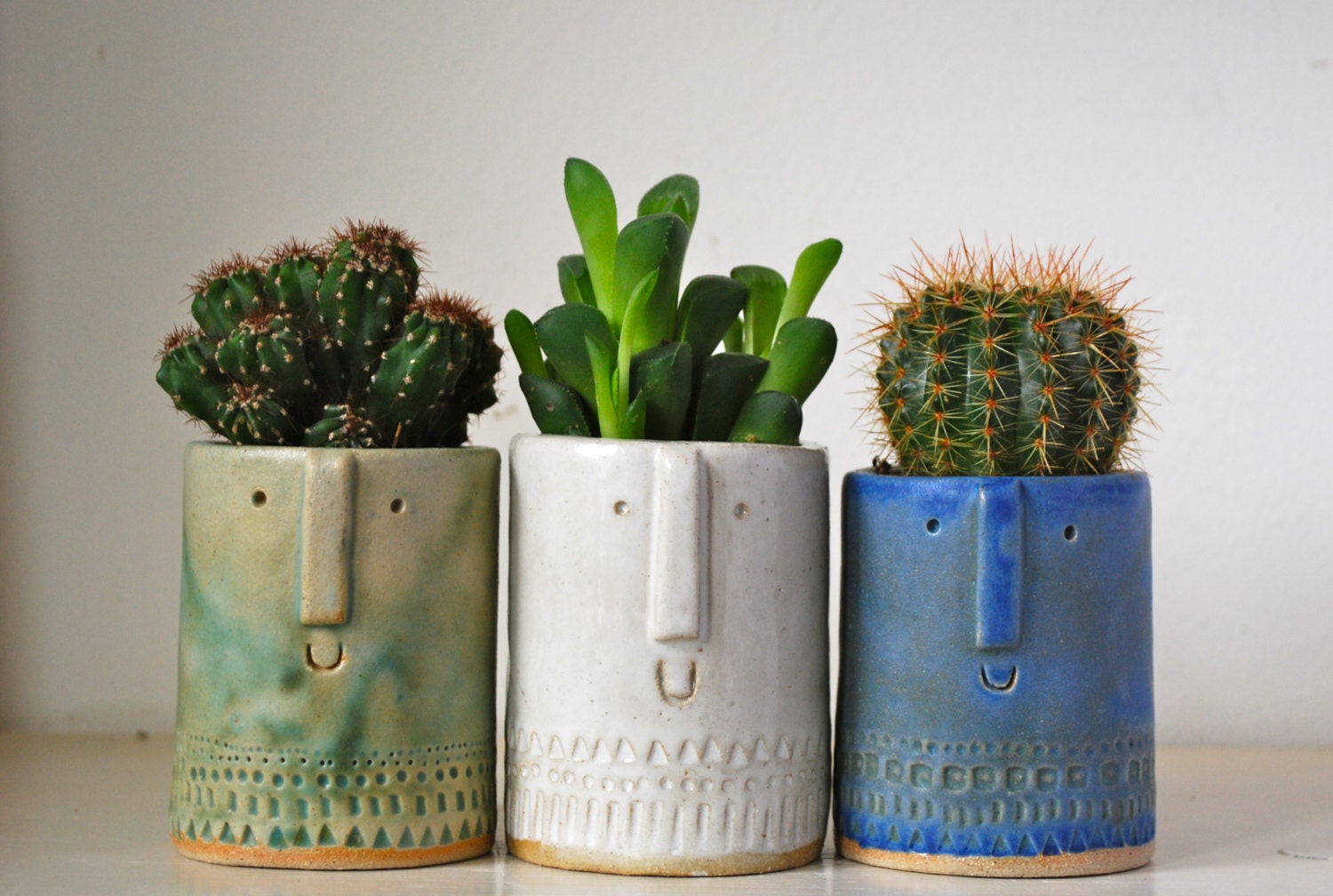 Little succulent or cacti pot in matt green glaze
