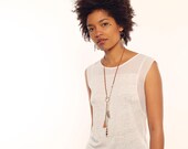 Asymmetric feather long necklace in brass tans, Black or beige.