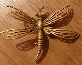 Dragonfly cut out antiqued gold toned metal brooch   pin