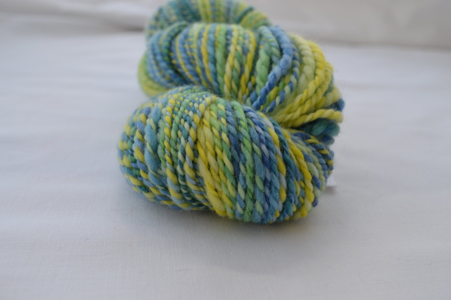 Hand dyed and hand spun plied yarn