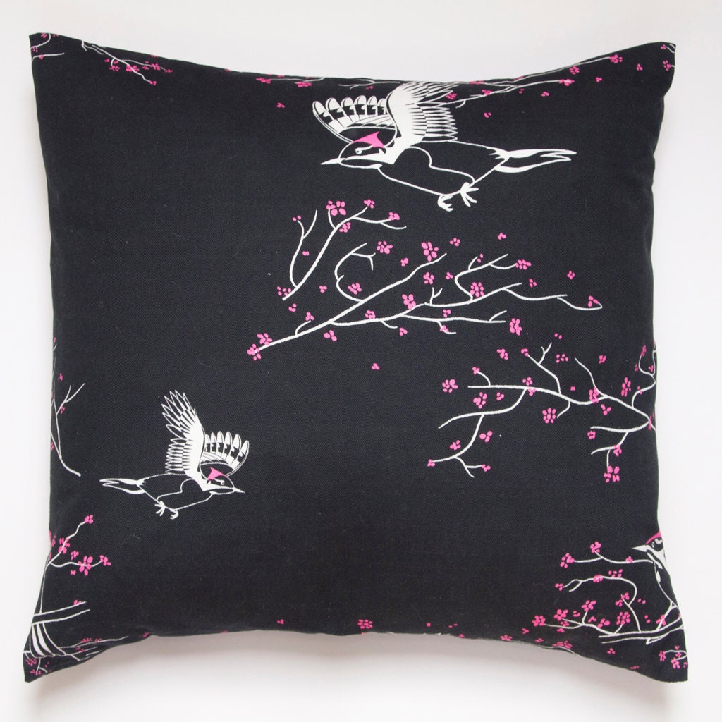 Cushion in Woodpecker black pink and white blossom patterned cotton fabric size 18" 45cm x 45cm