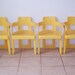 Set of Four Mid Century Modern Yellow Plastic Chairs mid 1960's