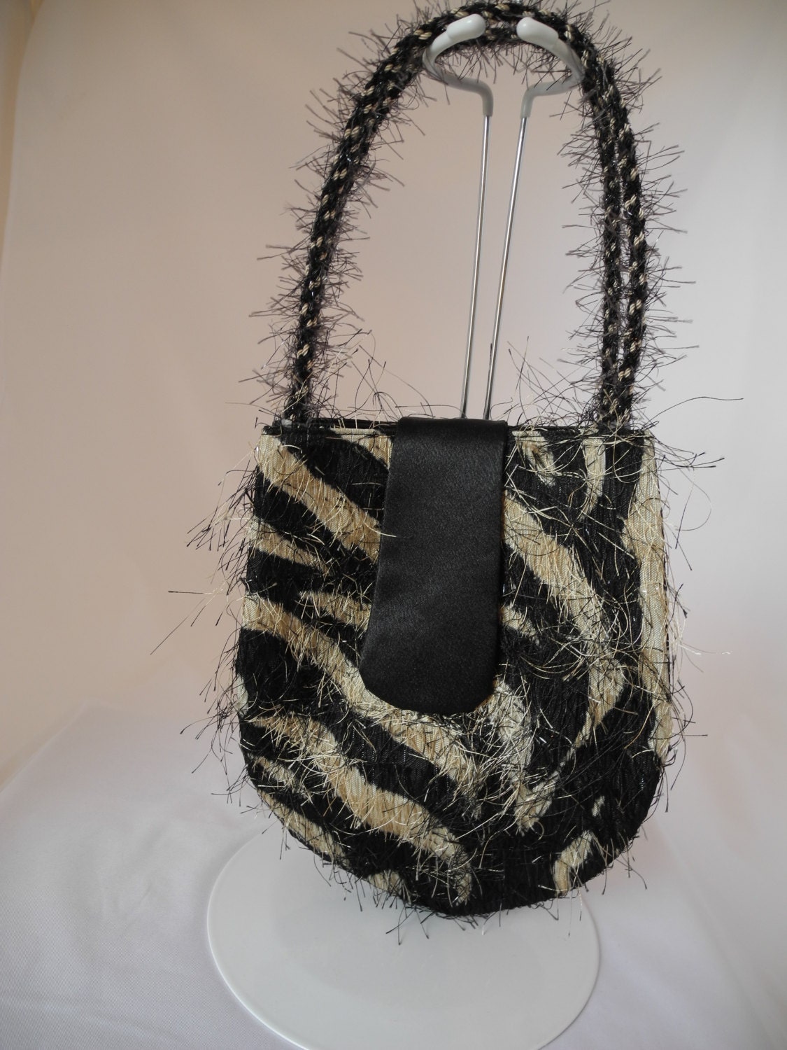 Prom purses have arrived. Susanspurses invites you to color, glitz and glamour of small handbags for prom.  Going fast.  Buy now