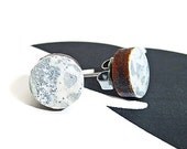 Round wooden stud post earrings white icing silver glitter and silver shimmer asymmetrical design