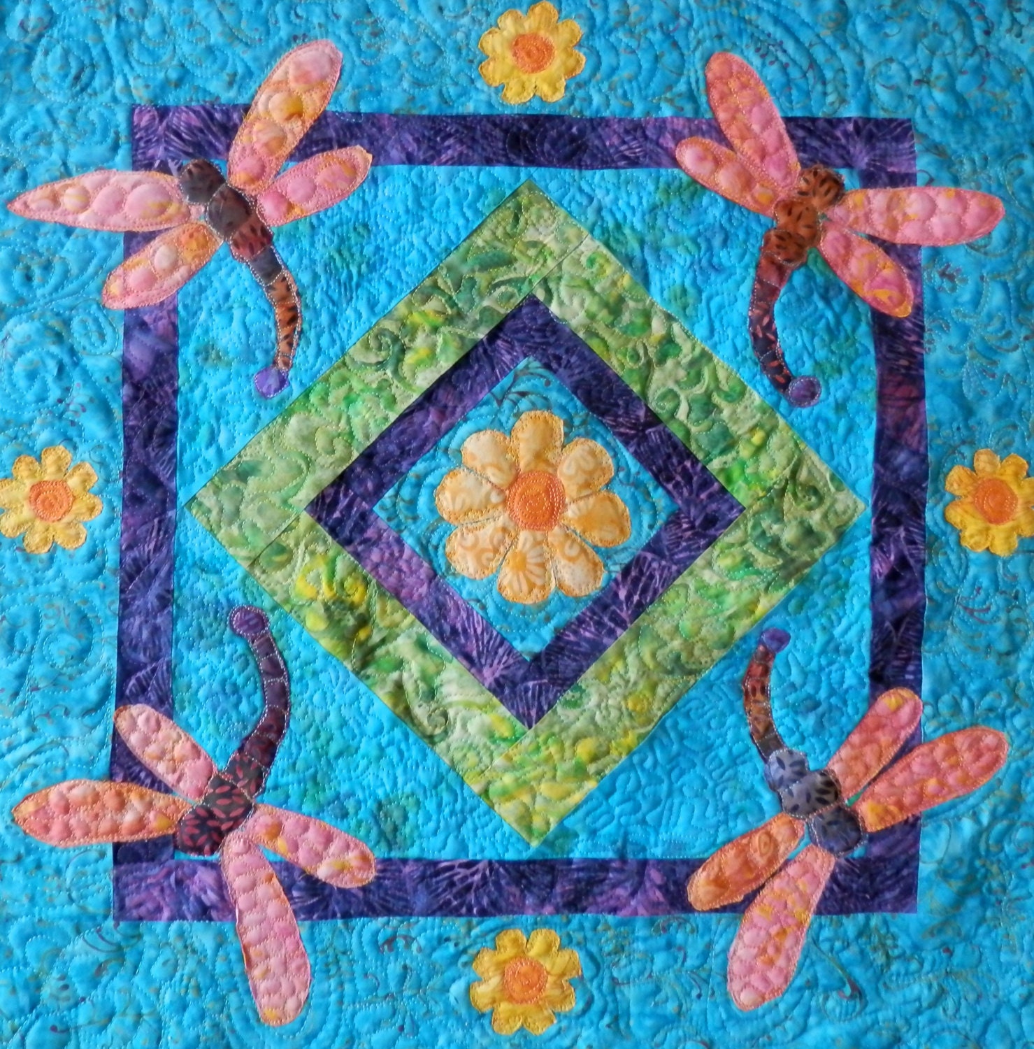 Dragonfly mini art quilt made with batik fabrics