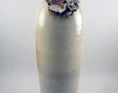 Tall white flower bottle