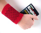 Red pure merino wool wrist warmers with black seed beads