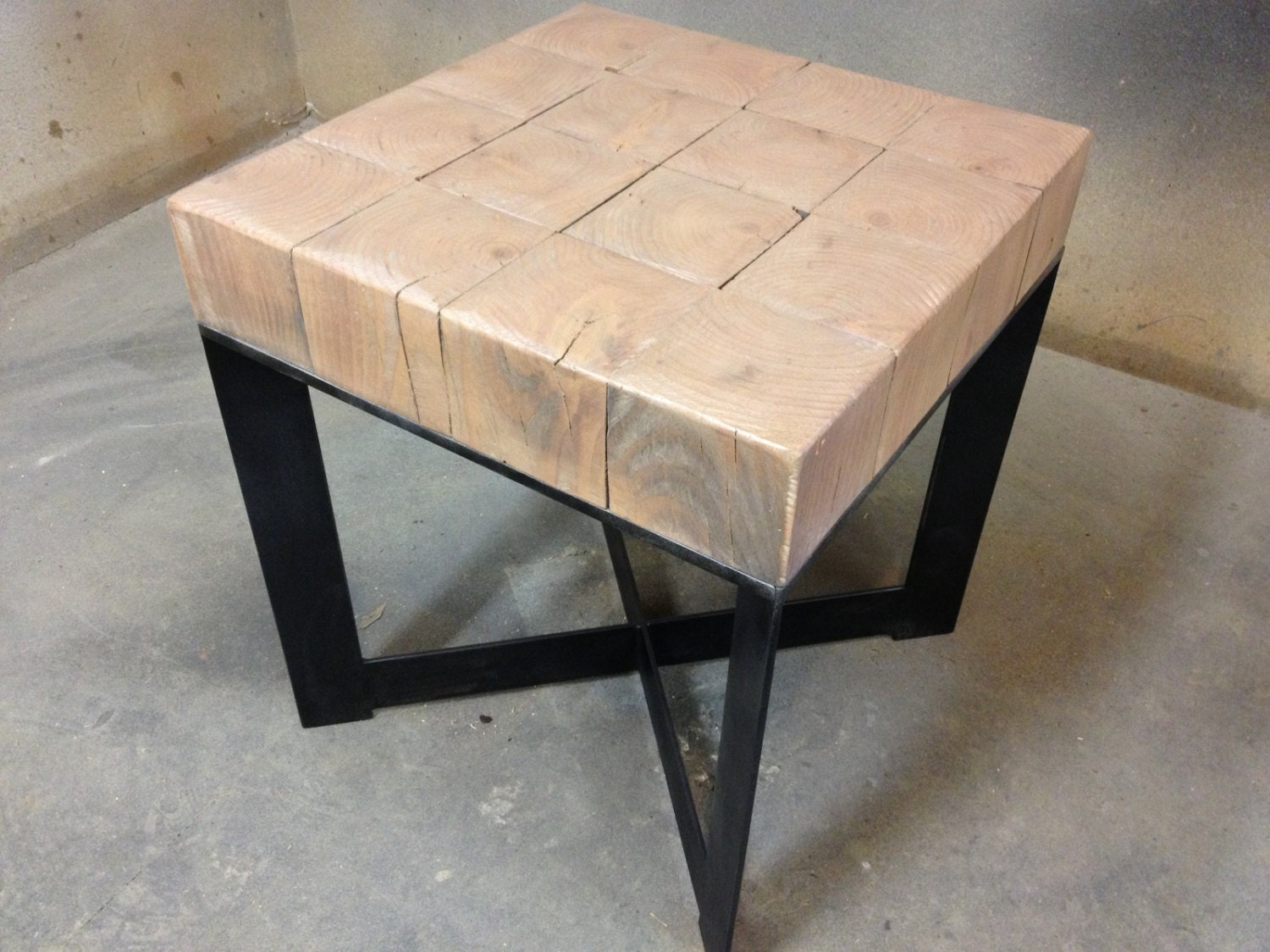 Side table with modern metal bottom and rustic wood top