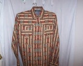 Handmade Brown Long Sleeve Western Shirt with  pearl snaps on the  cuffs, pockets, down the front.