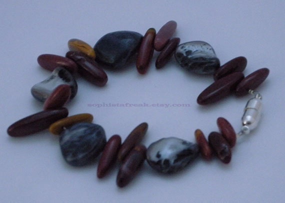 Magnet Clasp Bracelet 8" featuring blue shell beads with large red jasper chip beads