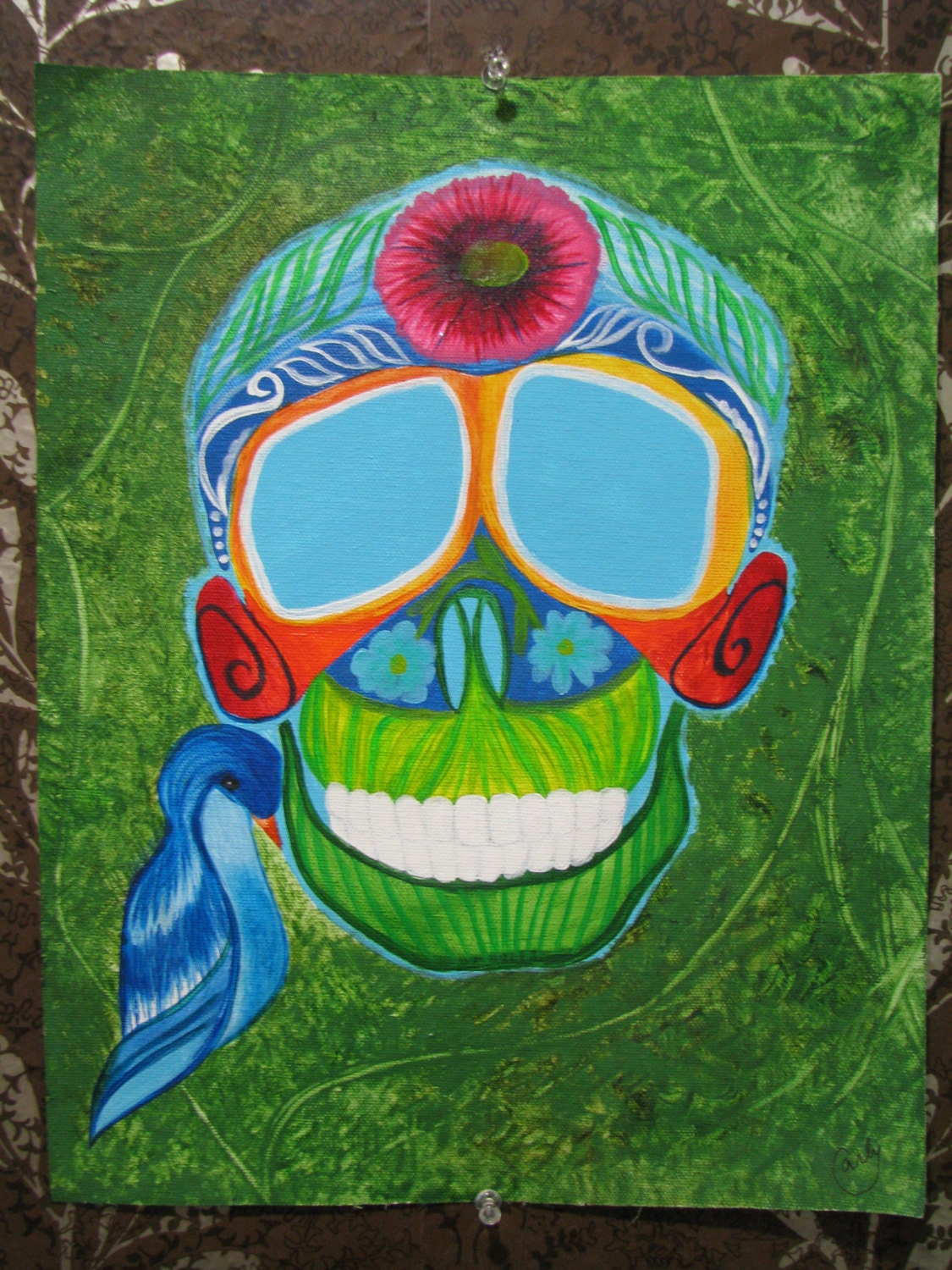 Original Floral Day of the Dead skull in abstract greenery with blue bird. 11 x 14 inch acrylic painting