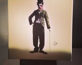 Zombie Chaplin (baby size) 5x5 inches - digital painting on giclee canvas  w/ wood frame (stand not included)