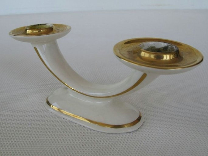 Two armed candlestick / candle holder made of gilded porcelain. VINTAGE