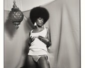 Sexy pinup girl with afro in panties, 1960s