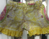 Girls ruffle shorts size 4, yellow