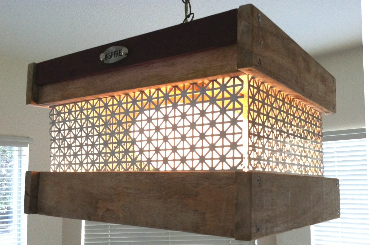 Hanging light made from upcycled shipping pallet wood and metal.  Pallet light.
