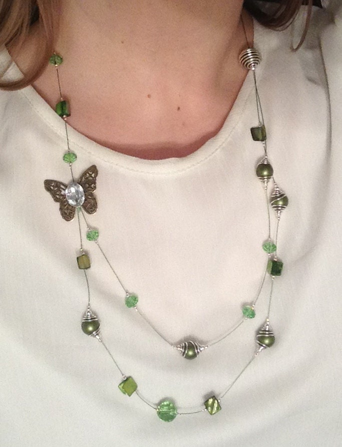 Green illusion necklace with green glass beads, natural shell and pearls, brass butterfly