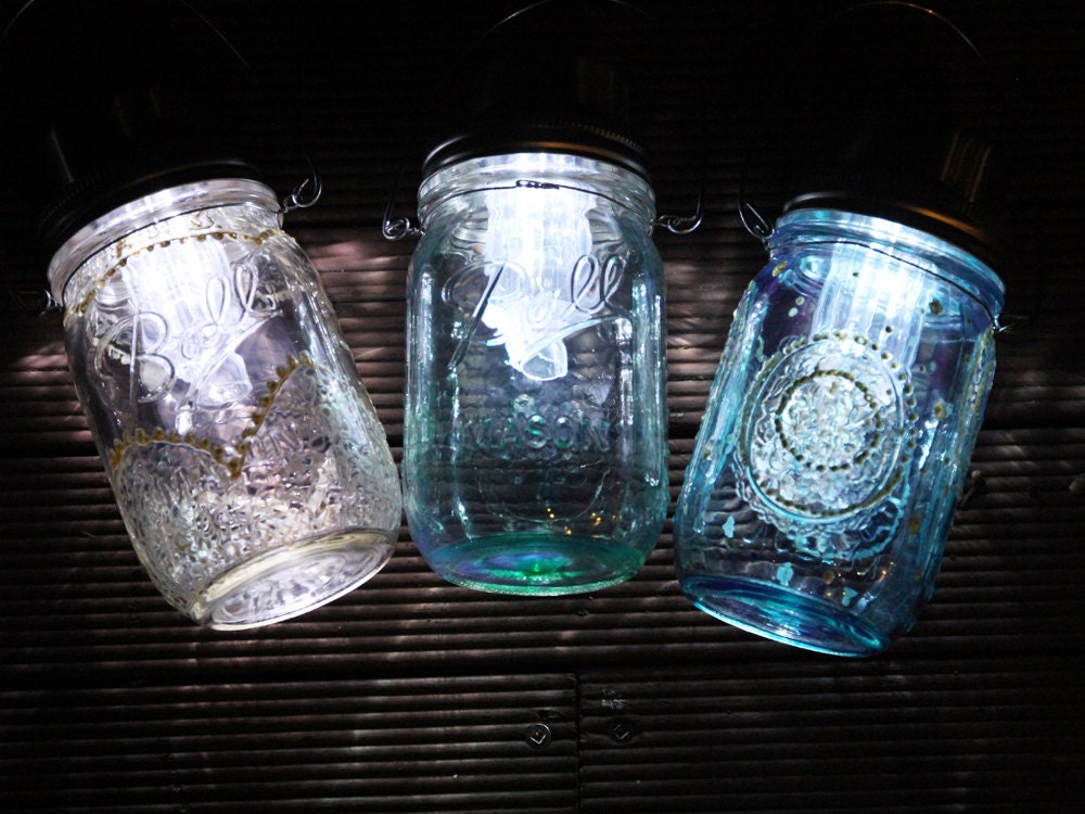 Dark green stained solar powered Ball Mason jar lantern, handmade and hand assembled in Sydney