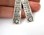 Impressions- Sterling silver and cubic zircon earrings.