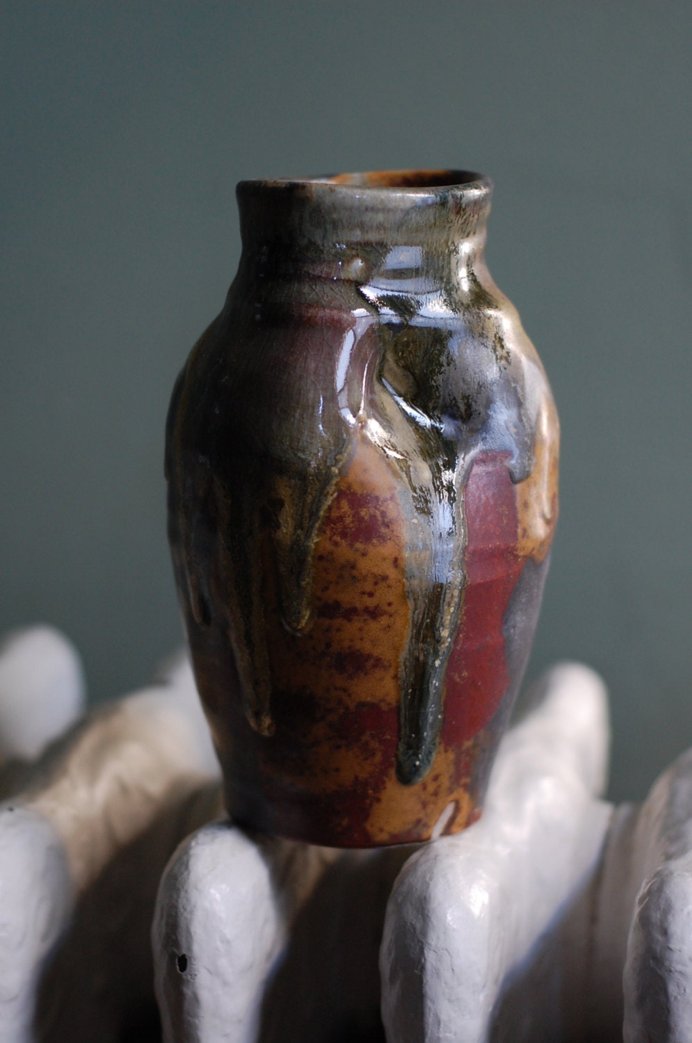 red stoneware vase