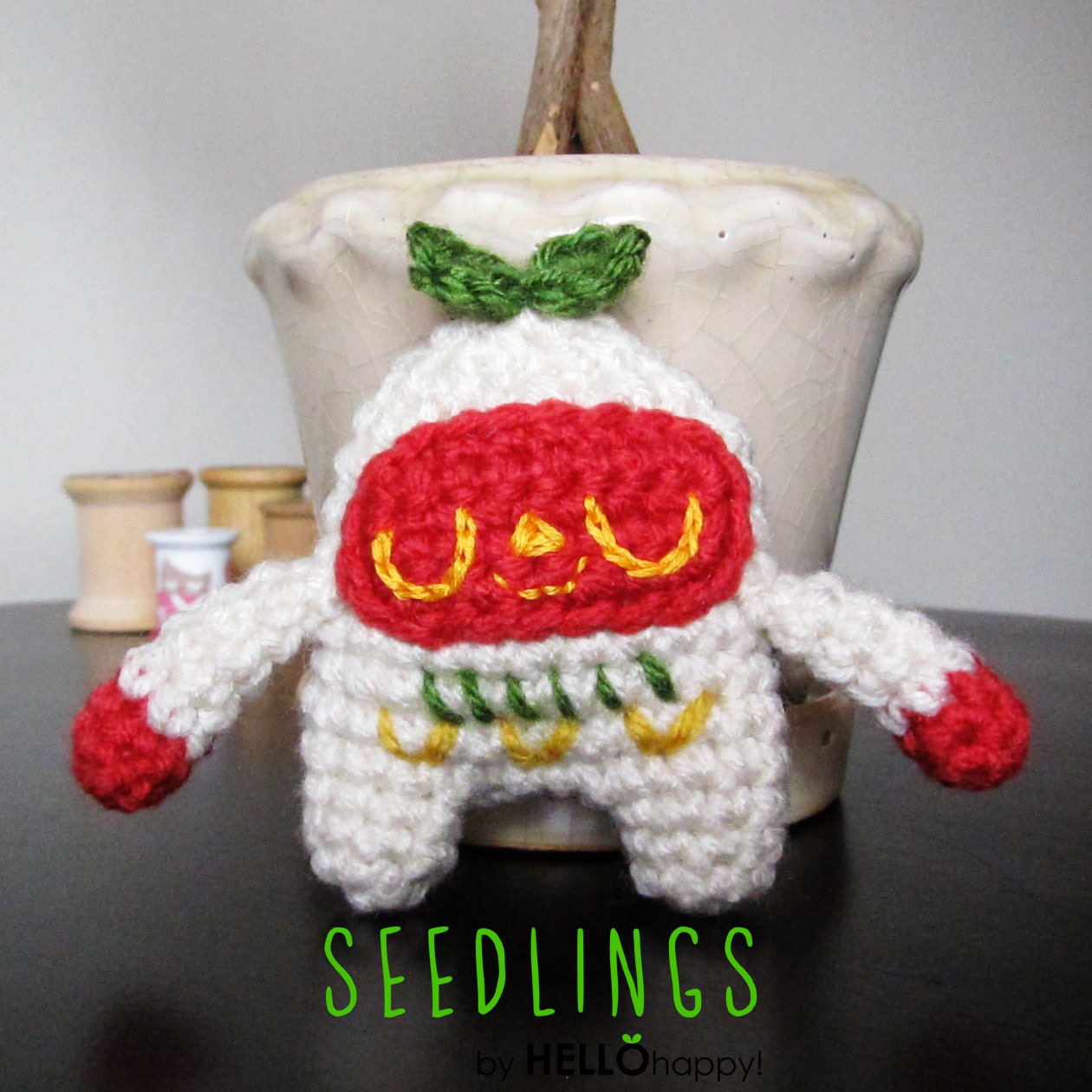 Seedling 003 - cute little amigurumi plant seedlings - off white with red and gold and dark green leaves