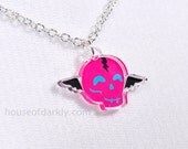 Flying Skully hot pink acrylic necklace on silver chain for the slightly scary