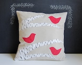 Winter red birds in a birch tree pillow cover