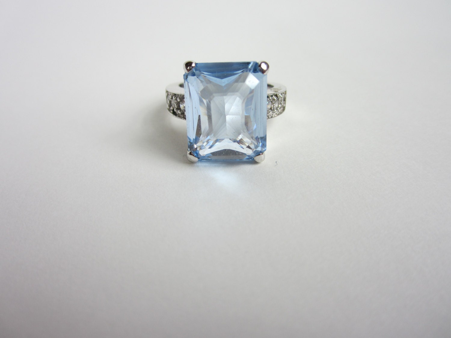 Vintage Sterling Silver Cocktail ring. Emerald Cut Blue Stone Center
