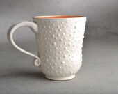Dottie Mug Ready To Ship Stoneware White Coffee Mug Cup With Orange Interior by Symmetrical Pottery