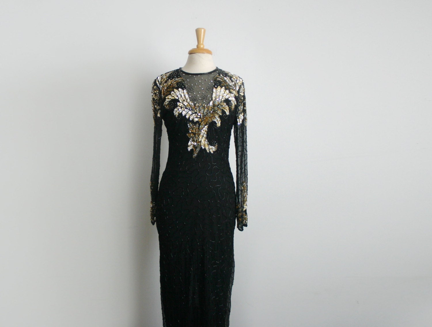 1980s bombshell black and silver and gold sequin embellished evening gown, size medium