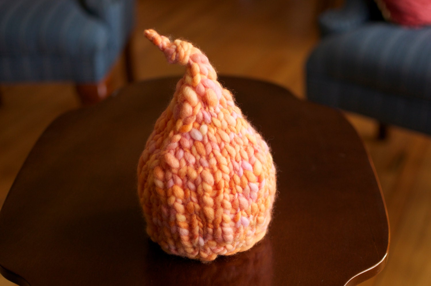 Pastel thick and thin peach and pink newborn hat.